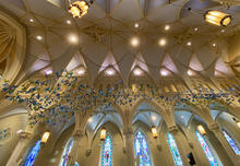 Origami doves suspended from the sanctuary ceiling